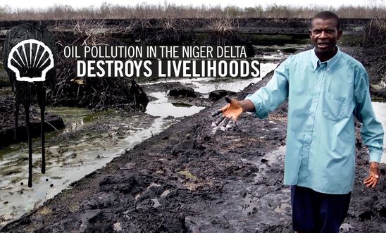 Pastor Christian Lekoya Kpandei showing the damage done to his fish farm in Bodo, Nigeria, May 2011. The farm flourished before the August 2008 oil spill, but the pollution destroyed his fish farm, leaving him and his workers without a regular income.