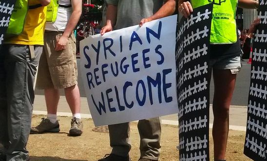 Syrian Refugees Welcome Sign