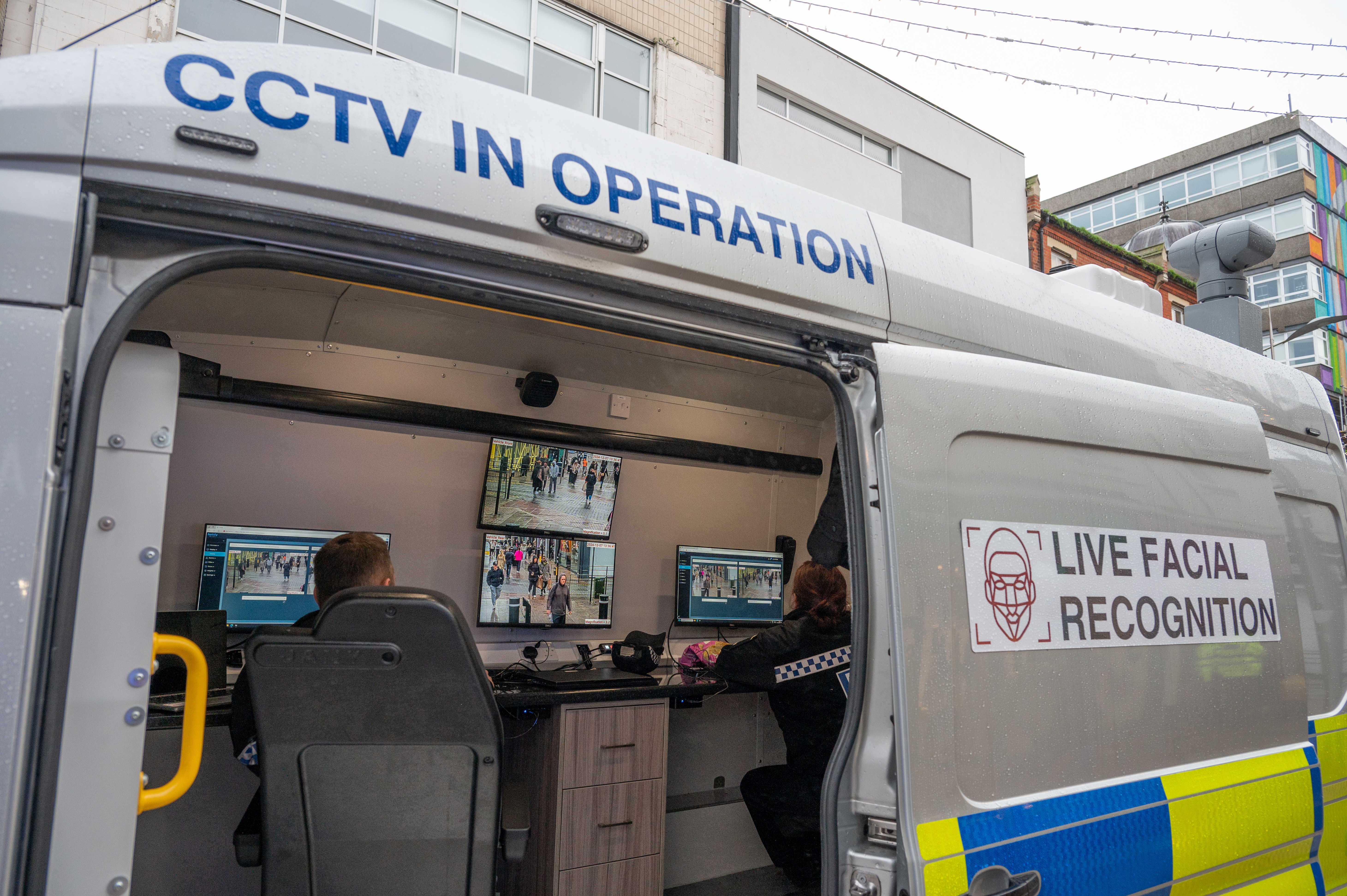 Police officers watch monitors in a live facial recognition van on the High Street on December 7, 2024 in Southend, England, United Kingdom. Essex Police today deployed two live facial recognition vans along the High Street. (Photo by John Keeble/Getty Images)