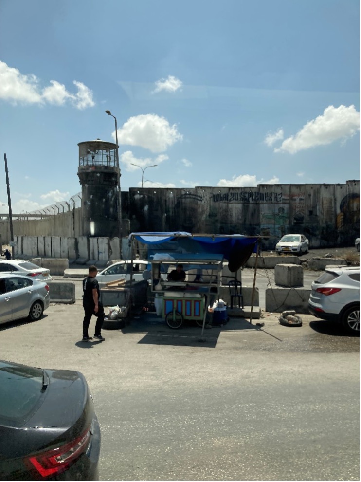 "Qalandiya: A military watchtower overlooking Qalandiya checkpoint"