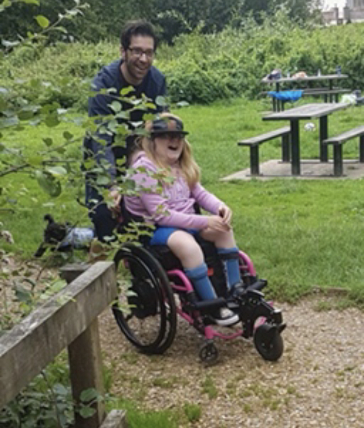 "image of Dan and his daughter outside at the park"
