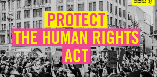 Reads: protect our human rights act