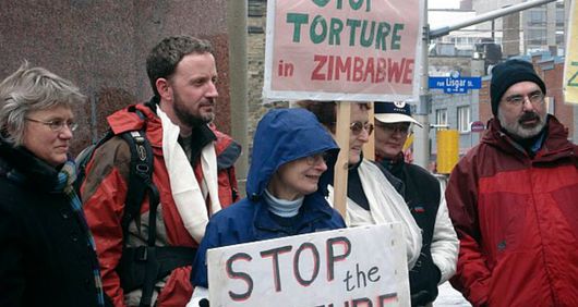 AI Canada protesting against torture in Zimbabwe