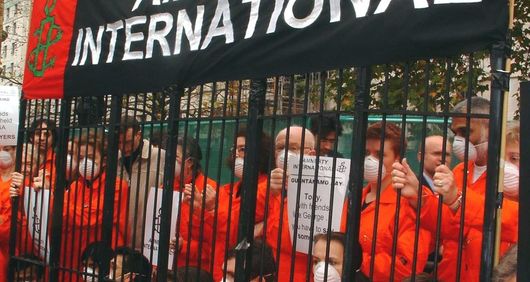 AI members behind bars. AI members behind bars.