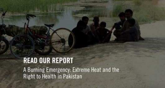 Men sitting down under the shade with text saying "Read Our Report" and the title of the report, which is A Burning Emergency: Extreme Heat in Pakistan