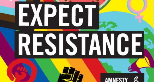A multi-coloured placard featuring various rights-based symbols like the black lives matter fist and Pride flags, that reads 'Expect Resistance'