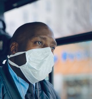 Bus Driver with a mask
