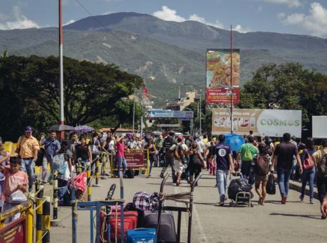 Venezuelan migrants crossing the border bridge