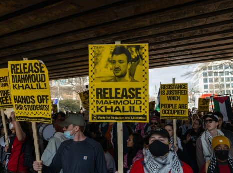 Demonstrators gather outside the U.S. Immigration and Customs Enforcement building