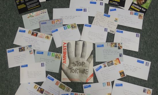An arrangement of letters written for the Stop Torture campaign