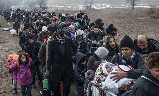 Migrants and refugees wait for security check after crossing the Macedonian border into Serbia Migrants and refugees wait for security check after crossing the Macedonian border into Serbia