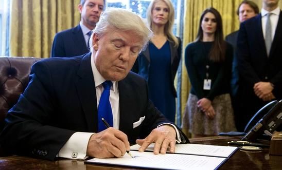 https://www.amnesty.org.uk/files/styles/poster/s3/2017-05/236101_donald_trump_signs_executive_orders.jpg?xX.swwtbzZkFPhu2aTQdQUjE9wmqlnB1&itok=syD8MSKZ