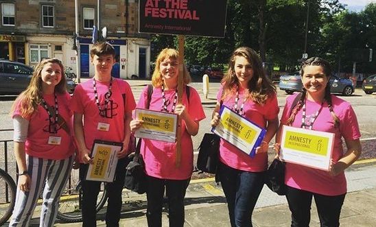 Amnesty staff campaigning at FestVols