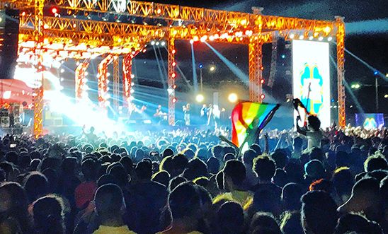 Rainbow flag being raised at a Mashrou' Laila concert in Cairo, Egypt on 22 September 2017