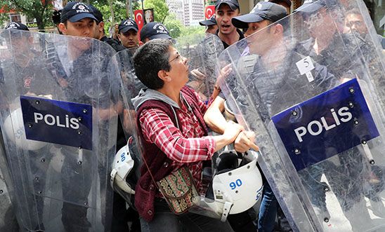 Riot police intervene to stop protesters demonstrating
