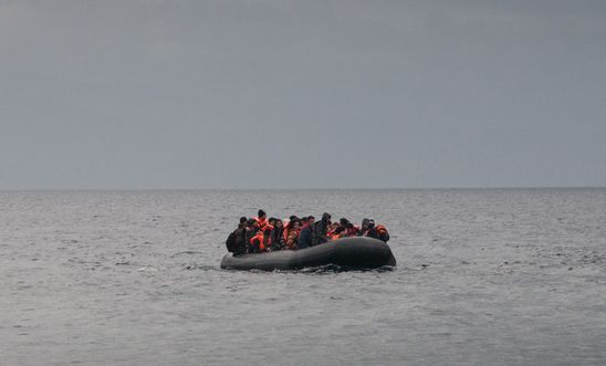 Refugees arriving by boat to Lesvos, Greece, from Turkey.