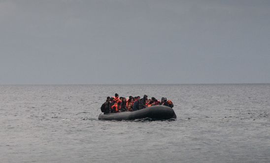 Refugees arriving by boat to Lesvos, Greece, from Turkey. Refugees arriving by boat to Lesvos, Greece, from Turkey.