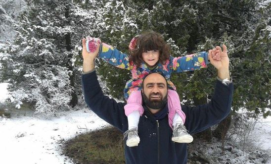 Ahmed H with his daughter 