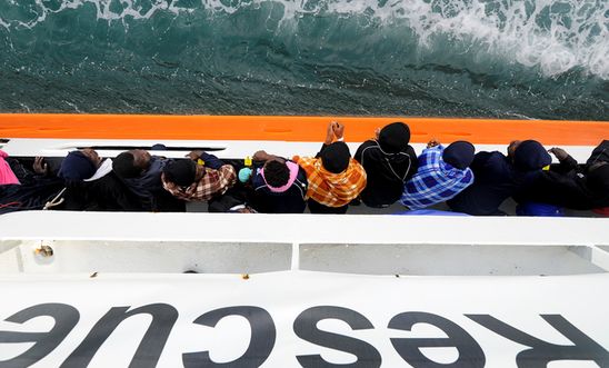 Refugees and migrants wait to disembark from Aquarius in the Sicilian harbour of Catania - May 2018