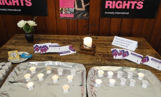 Amnesty candle, tea lights and banners Amnesty candle, tea lights and banners