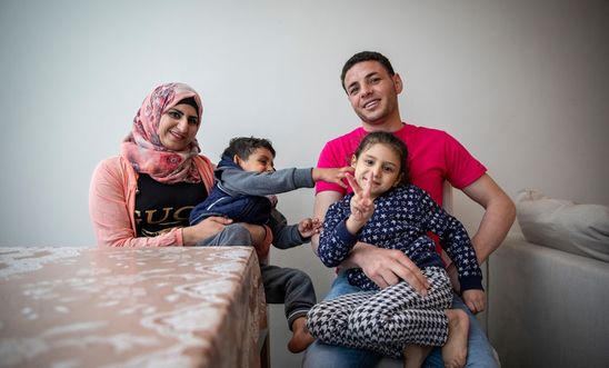 Rahaf, 25, and Monther, 30, from Syria and their children Aseel and Mohammad at their home in London, 10 June 2019