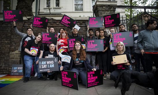 Amnesty International and Stonewall activists gather outside the Russian Embassy in London to hand in petition. Amnesty International and Stonewall activists gather outside the Russian Embassy in London to hand in petition.