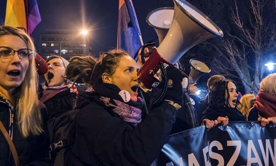 Women take part in a protest in Poland