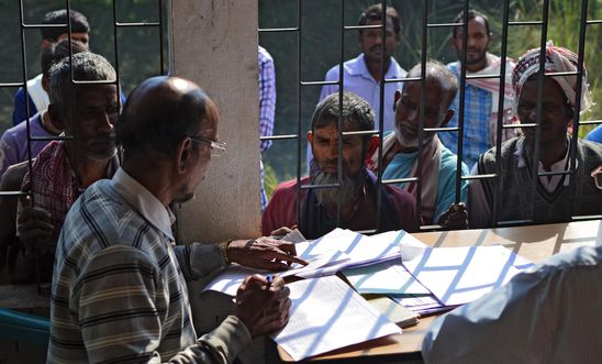 eople wait to check their names on the first draft of the National Register of Citizens (NRC) at Goroimari of Kamrup district in the Indian state of Assam on January 1, 2018 eople wait to check their names on the first draft of the National Register of Citizens (NRC) at Goroimari of Kamrup district in the Indian state of Assam on January 1, 2018