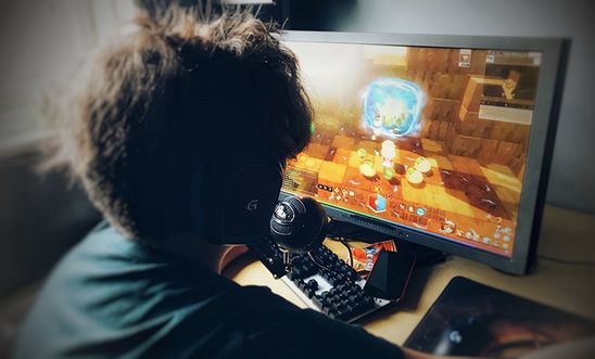 Boy playing video game Boy playing video game