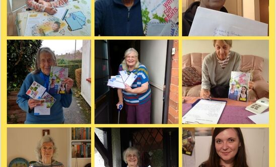 Amnesty members holding letters