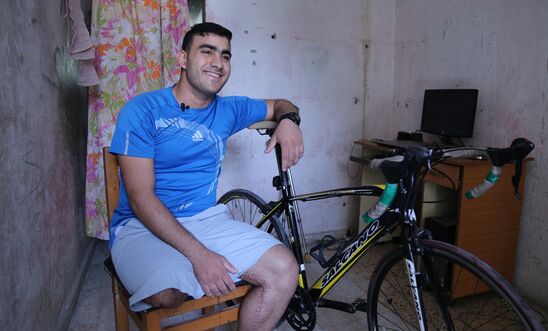 Alaa al-Dali, 21, a cyclist who was shot and injured during the Great March of Return protests, who subsequently lost his right leg.