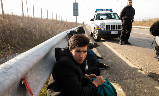 Two migrants are detained by Greek Police, near the village of Kavyli, in Evros, close to the Greek-Turkish borders, on 03 March 2020 Two migrants are detained by Greek Police, near the village of Kavyli, in Evros, close to the Greek-Turkish borders, on 03 March 2020