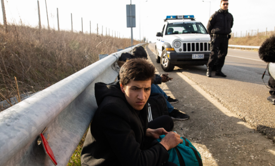 Two migrants are detained by Greek Police, near the village of Kavyli, in Evros, close to the Greek-Turkish borders, on 03 March 2020