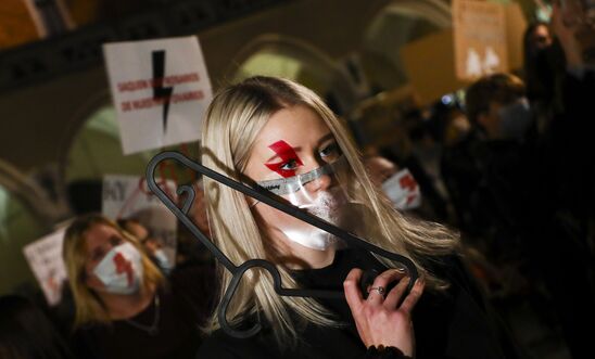 People demonstre at the Main Square during another day of the protests against restrictions on abortion law in Poland.