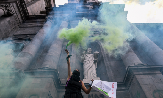 Women take part in demonstrations to demand justice for victims of femicide and stop violence against women: March 8, 2021