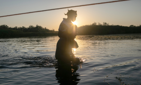 Haitian immigrants cross the Rio Grande back into Mexico from Del Rio, Texas on September 20, 2021 Haitian immigrants cross the Rio Grande back into Mexico from Del Rio, Texas on September 20, 2021