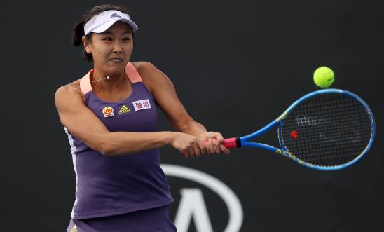 Shuai Peng of China plays a backhand during her Women's Doubles first round match  in Melbourne, Australia.