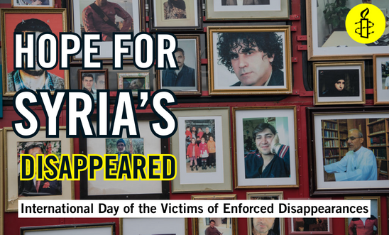 A bus displays photographs of missing Syrians as it arrives for a demonstration by 'Families for Freedom' in Parliament Square on October 11, 2017 in London, England. text reads "hope for Syria's disappeared"