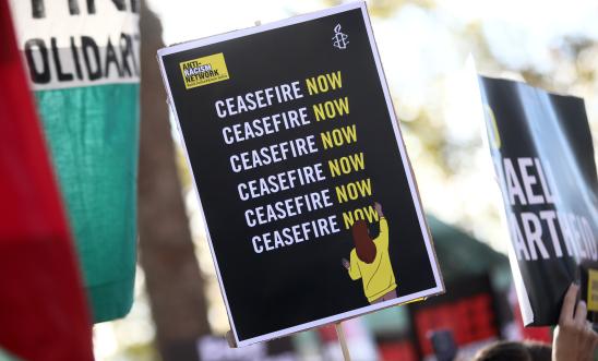 Image shows a ceasefire now sign