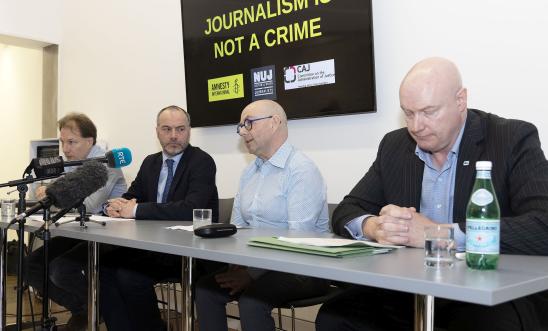 l-r: Daniel Holder, CAJ, Patrick Corrigan, Amnesty International, and Barry McCaffrey, Journalist, and Ian McGuinness, NUJ Irish Organiser, address a press conference, Belfast – March 6 2024