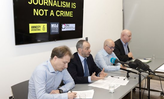 l-r: Daniel Holder, CAJ, Patrick Corrigan, Amnesty International, and Barry McCaffrey, Journalist, and Ian McGuinness, NUJ Irish Organiser, address a press conference, Belfast – March 6 2024