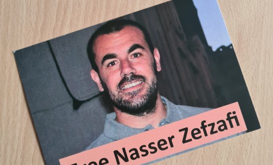 Photo of postcard with a photo of Nasser Zefzazi with caption "Free Nasser Zefzazi" Photo of postcard with a photo of Nasser Zefzazi with caption "Free Nasser Zefzazi"