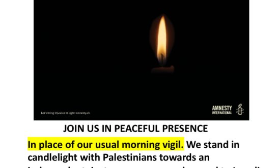 Candle shining in the dark