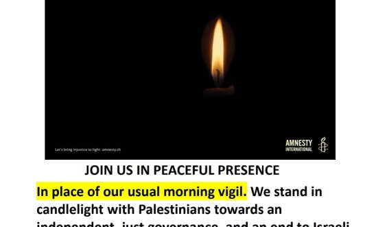 Candle shining in the dark 