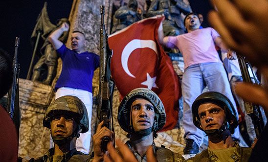 Turkish solders stay at Taksim square as people react in Istanbul