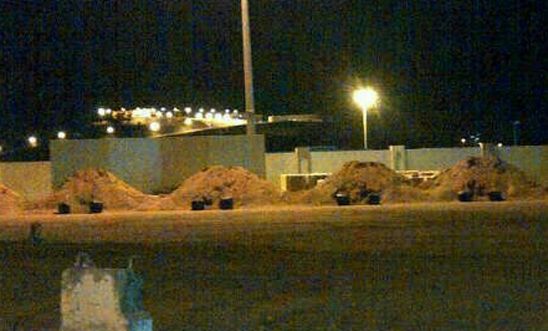 Execution mounds erected in a public square in March 2013