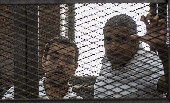 Baher Mohamed and Mohamed Fahmy at a court hearing in 2015