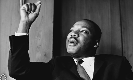 Martin Luther King Jr. at a press conference in London in 1964