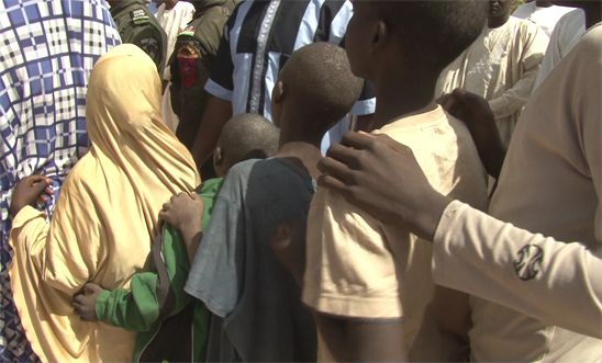 Children detained at Giwa barracks in a queue during their release ceremony