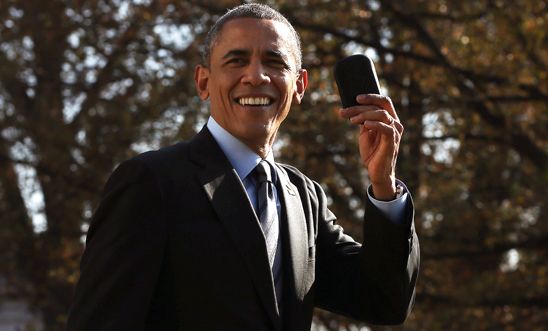  President Barack Obama holds up his Blackberry